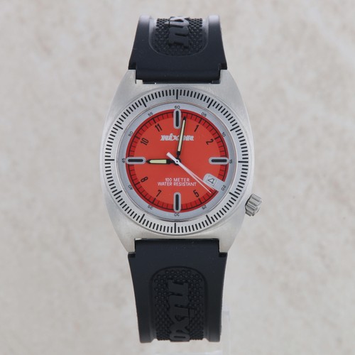Nixon orange dial clutch - dial,