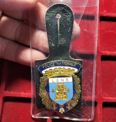 128 pucelle insigne - ~,
