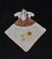 Peluche doudou bourriquet plat