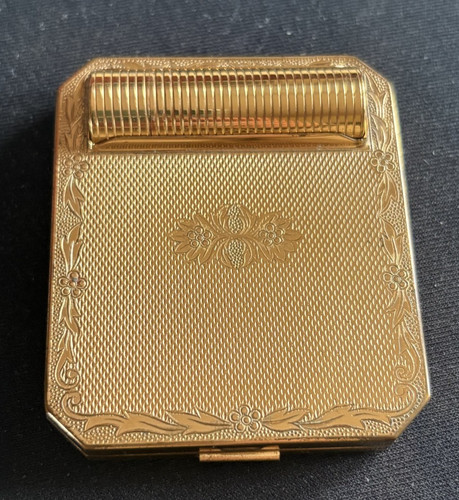 Poudrier ancien doré avec
