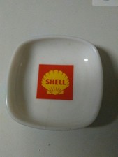 SHELL. rendu de monnaie en porcelaine.