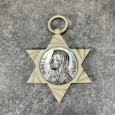 Médaillon de Berceau. Vierge