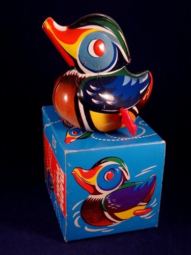 Ancien jouet mécanique - , tôle