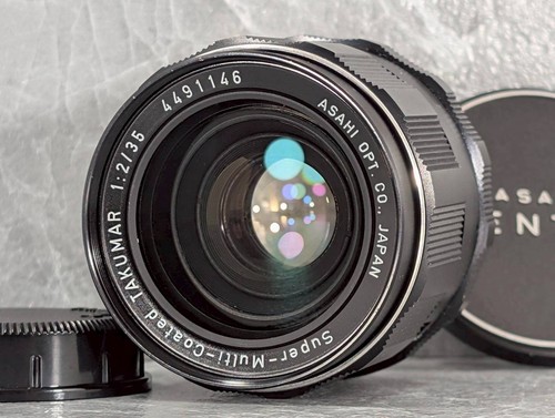 [Optique presque comme neuf]
