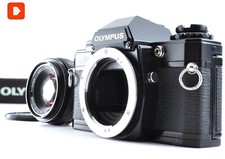 [NM+5] Appareil photo reflex argentique 35 mm Olympus OM10 QUARTZ + testé ! O...