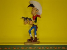 Figurine Atlas LUCKY LUKE 2003 d'après Marie LEBLON - Lucky Luke tirant 2 colts