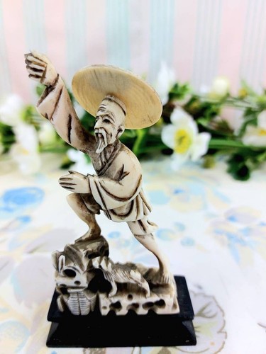 Statuette chinoise pêcheur