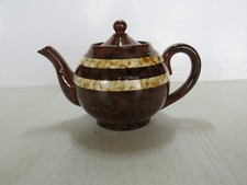 petite théière verseuse