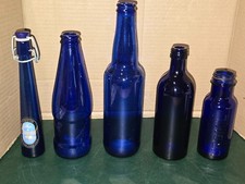 LOT DE 5 BOUTEILLES EN VERRE