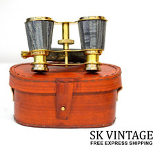 Anciennes jumelles de verres d'opéra vintage blanche nacre et manche laiton