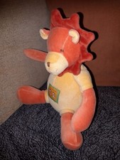 Doudou musical lion orange