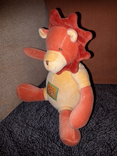 Doudou musical lion orange