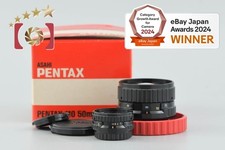 Pentax 110 24mm f/2.8 + 50mm