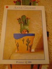 PUZZLE  ANNE GEDDES - Enfant chapeau cactus dans un pot - 900 pièces - Blatz