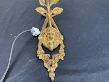 Applique en bronze Louis XIV , à décor de Bacchus avec tulipes holophane .