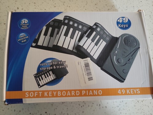 Key roll piano portable - up,