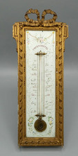 Thermomètre en bois sulpté