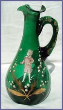 CARAFE EN VERRE SOUFFLÉ  ÉMAILLÉE DÉCOR PETIT GARÇON ET MUGUET XIX ème siècle