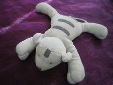 Doudou peluche couché ours