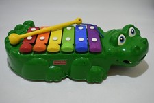 Crocodile Fisher Price jouet musical xylophone musique éveil jeu