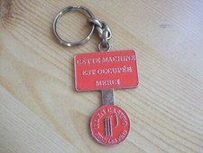 PORTE CLES JETON MACHINE