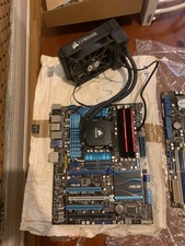 Lot carte mère CPU Ram : Asus P8P67 Deluxe + Intel Core i7-2600K + 8 Go DDR3 TOP