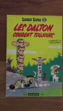 LUCKY LUKE LES DALTON COURENT TOUJOURS DOS JAUNE 1964 TTBE