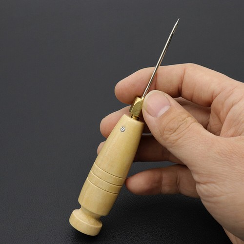 Poinçon coudre le - ,
