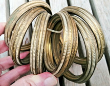 lot de sept anneaux de rideaux en Cuivre ( creux )