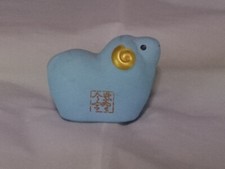 Poupée amulette en argile