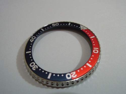 New stainless rotating bezel - new,