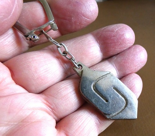 Ancien porte clé - , logo