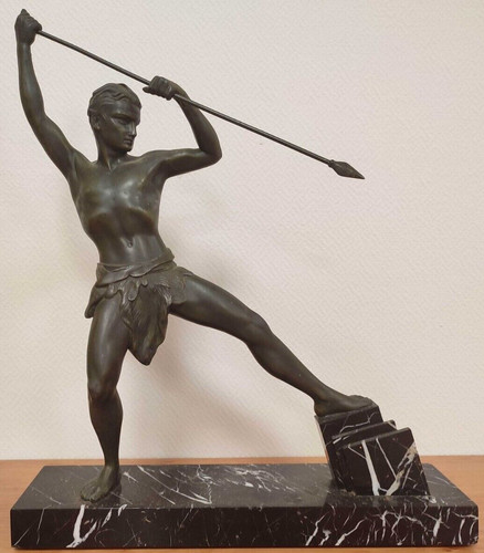 Sculpture chasseur ours