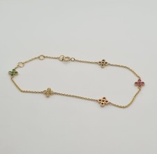 Bracelet or jaune 18 carats serti de fleurs saphir multi-couleur