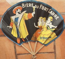 1537 : 1 EVENTAIL : BIERE DU FORT CARRE : DIAMETRE : 24 CM : BON ETAT .