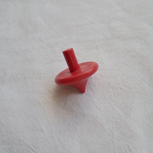Toupie rouge bonux objet - toupie,