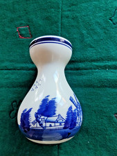 petit vase faience bleu de