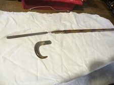 Canne ancienne à système de