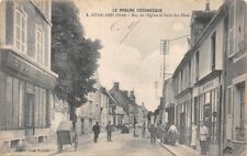 Rémalard - rue de l' église et salle des fêtes