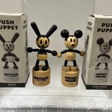 Marionnette poussoir Oswald en