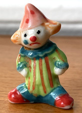 Fève clown pierrot bébé - fève,