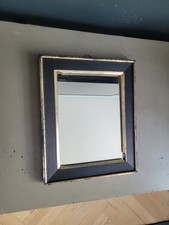 Miroir ancien en bois noir et