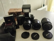 Nikon F70  appareil photo argentique + objectifs + flash