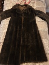 Manteau de fourrure marron taille 38