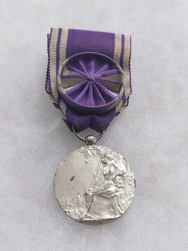 Une médaille officier - officier, "