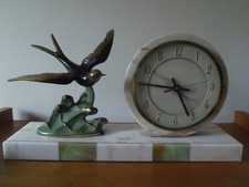 pendule  art déco au décor d'hirondelle