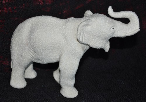 Statue éléphant porcelaine