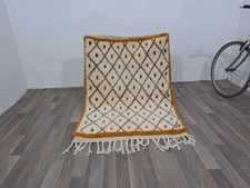 Costume tapis blanc marocain