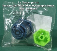 La Vache qui rit, lanceur de toupie bleu avec toupie jaune Star Academy