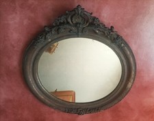 Important miroir oval mural et